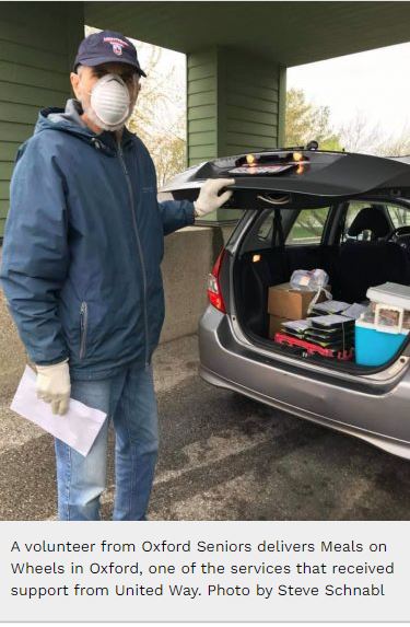 A volunteer from Oxford Seniors delivers Meals on Wheels in Oxford