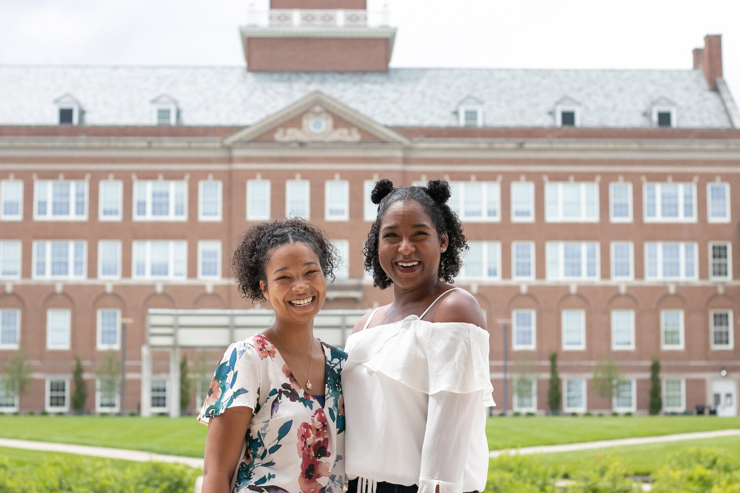 2 woman on college campus